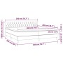 Cremefarbenes Boxspringbett 200x200 cm mit Matratze und Kopfteil. Bett aus Stoff mit Matratzenauflage.
