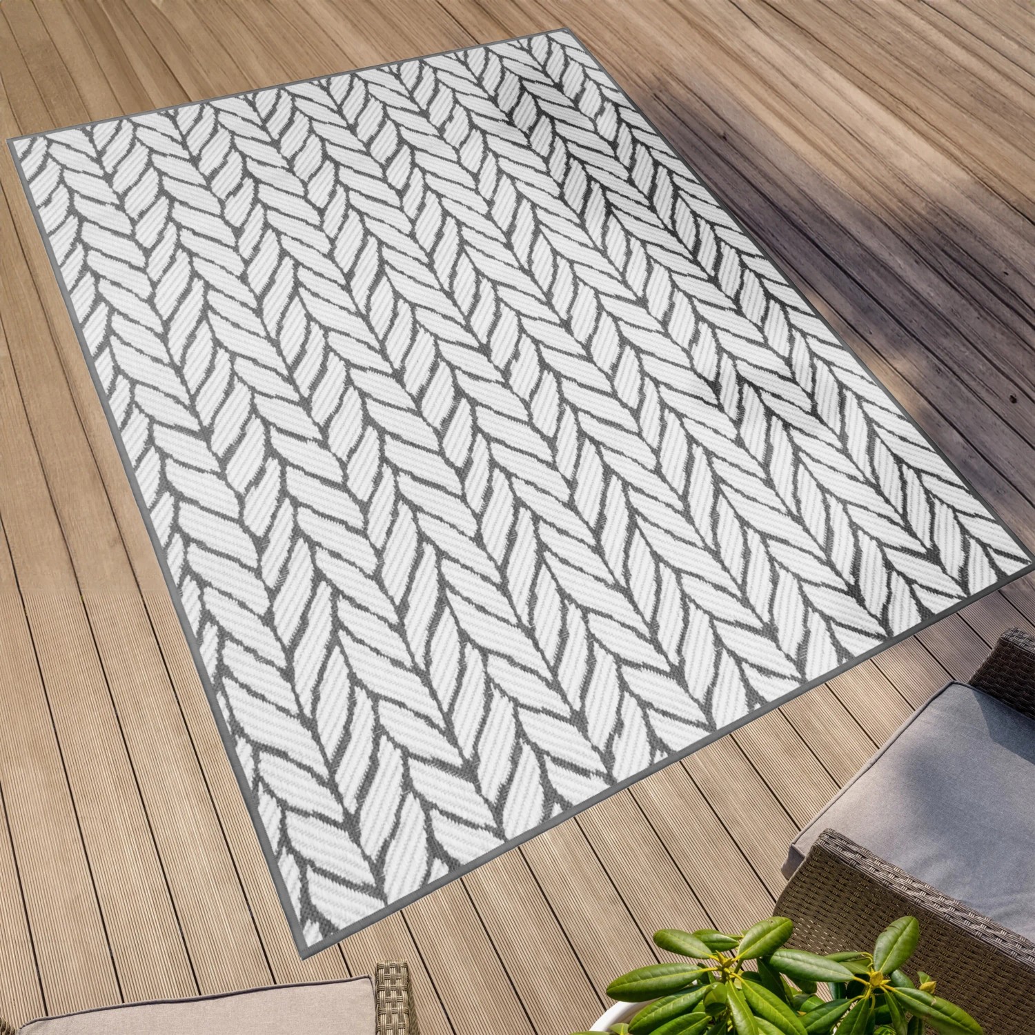 Grauer Primaflor In- und Outdoorteppich 160x220cm mit Strickmuster für Terrasse und Balkon.