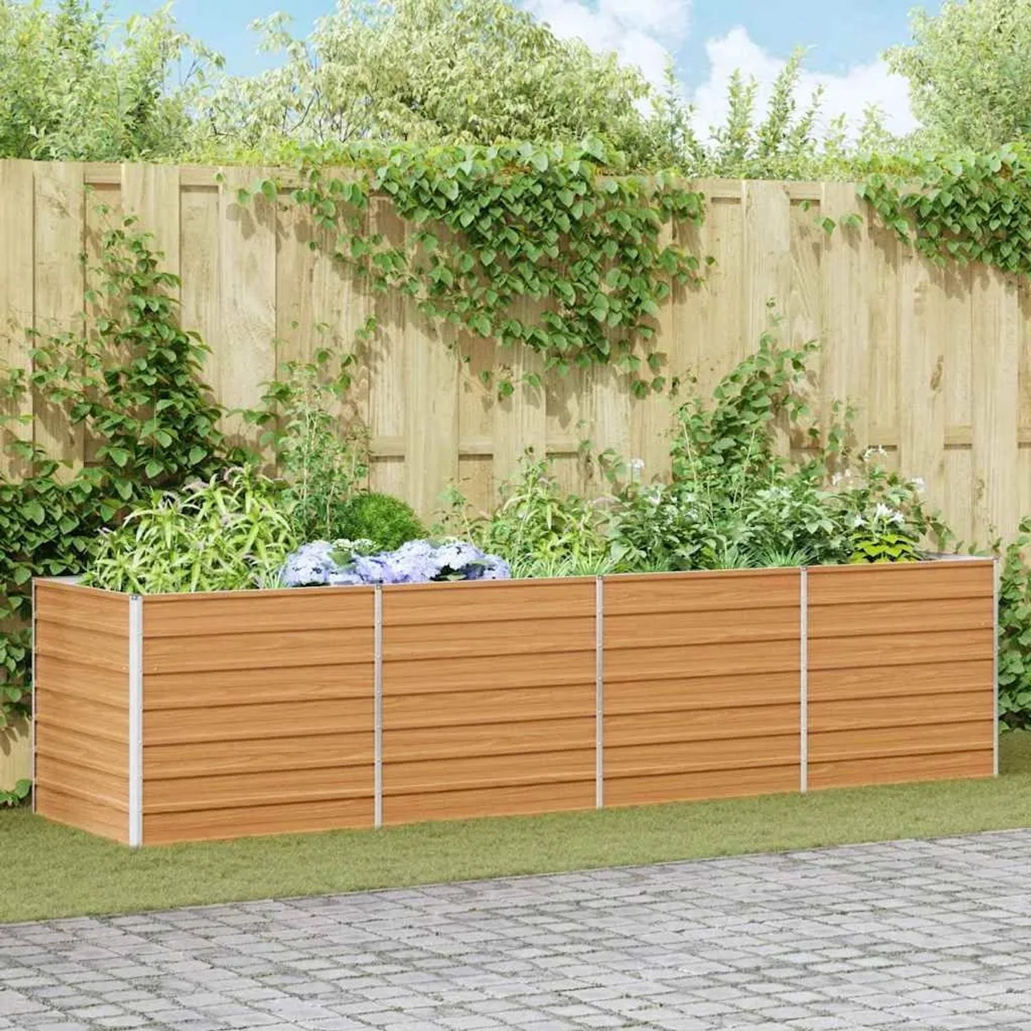 Hellbraunes vidaXL Hochbeet aus verzinktem Stahl mit Pflanzen auf einer gepflasterten Terrasse. Ideal für Garten und Blumenkästen.