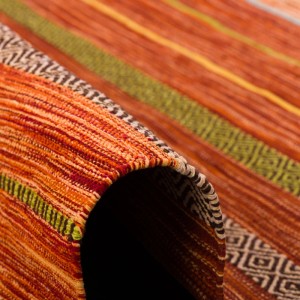 Detailansicht: Handgewebter Kelim Teppich Kalleen Terrakotta, 170x240cm, mit Streifenmuster.