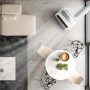 Midea Mobile Klimaanlage Silent Cool 26 Pro, weiße Ausführung in Wohnraum-Szene.