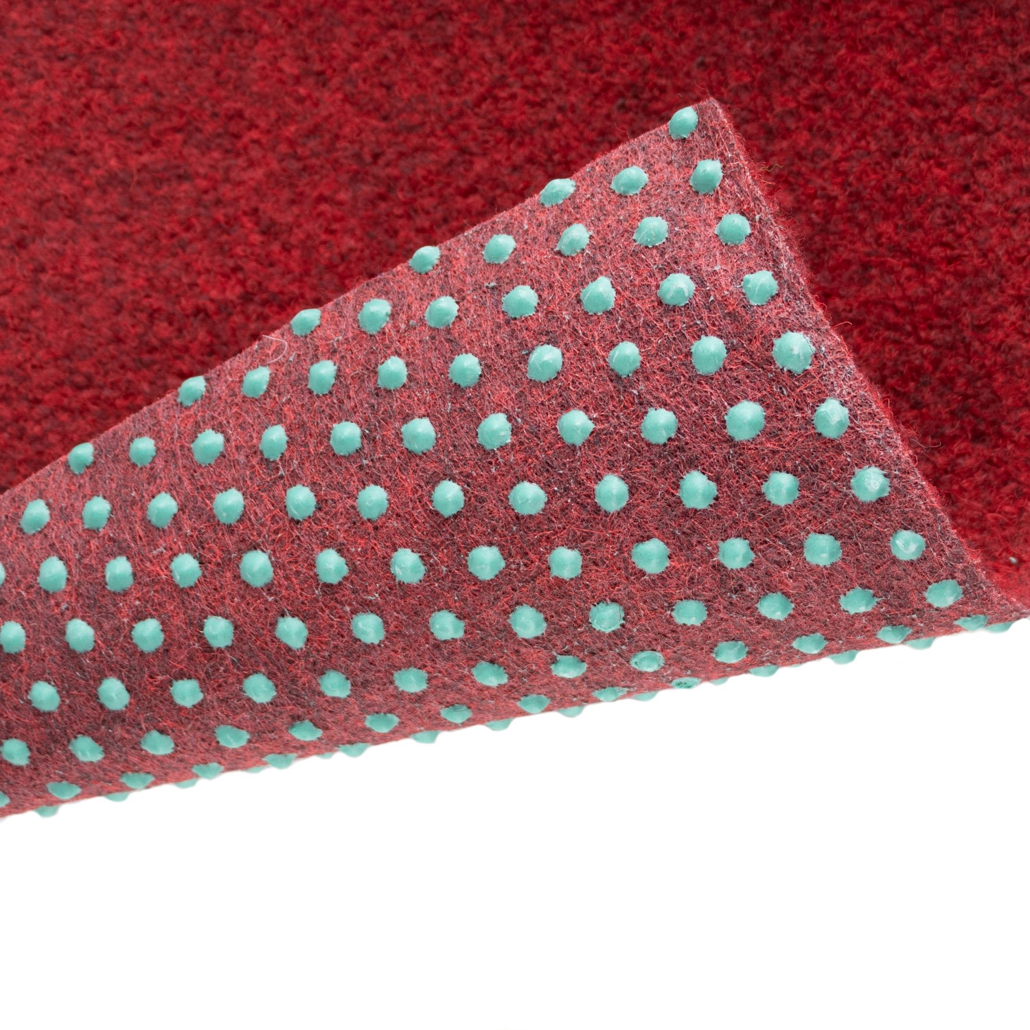 Nahaufnahme: Primaflor Rasenteppich Green Rot mit Noppen für Balkon & Terrasse.