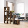Braunes Vasagle Bücherregal mit 10 Fächern als Raumteiler im Wohnzimmer.