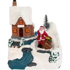 Beleuchtete Weihnachtsdorf Figur mit Schneelandschaft, Haus, Weihnachtsmann, Geschenken und Baum. Mehrfarbige Weihnachtsdekoration aus Kunststoff.