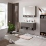 Modernes Bad mit Fackelmann Waschtisch-Set B.Paris in Cubanit Grau, Glasbecken und Spiegelschrank.