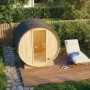 FinnTherm Fasssauna Mini XXS aus Holz mit Liege im Garten.