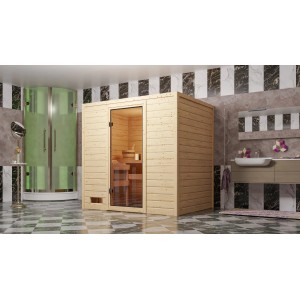 Woodfeeling Sauna Selena mit bronzierter Glastür und 9 kW Ofen im Badezimmer.