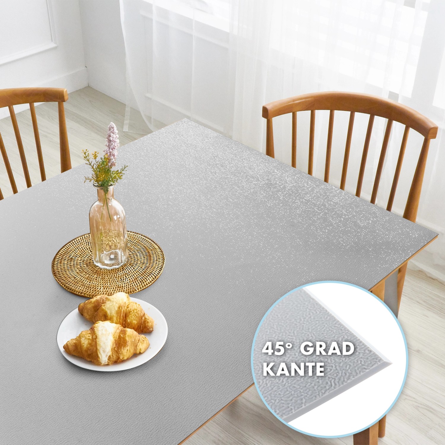 Hellgraue KARAT Tischfolie Empire 110x55cm mit abgeschrägter Kante auf Tisch.