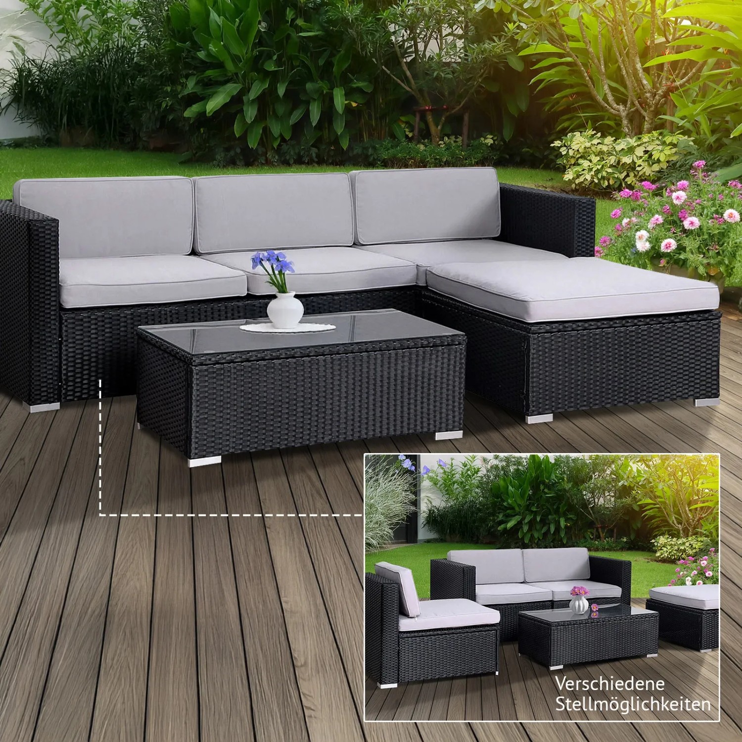 Schwarze Svita California Polyrattan Gartenlounge mit Tisch und grauen Kissen im Garten.