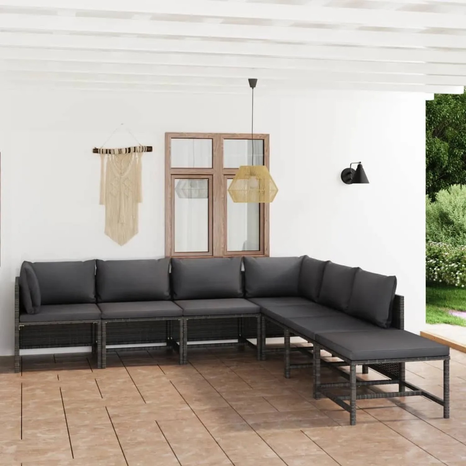 Graues 7-tlg. vidaXL Garten Lounge Set aus Rattan mit anthrazitfarbenen Kissen.
