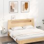 Zwei graue Wand-Nachttische vidaXL neben einem Bett im Schlafzimmer.