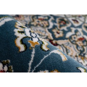 Detailansicht: Blauer Kurzflor Teppich mit orientalischem Muster, 80x150 cm.