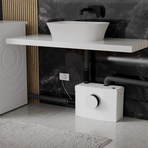 Juskys Hebeanlage 600W im Badezimmer unter Waschbecken und Waschmaschine. Schmutzwasserpumpe in Weiß.