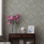 Laura Ashley Vliestapete Parterre Sage mit floralem Muster in Salbeigrün.