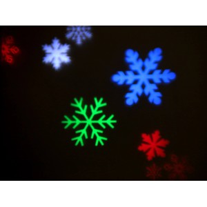 LED Projektor mit bunten Schneeflocken für Außen- und Innenbereich. Dekorative Außenleuchte.