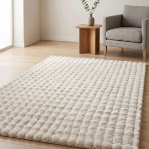 Cremefarbener Art Universe Bubble Teppich 80x150 cm mit Kurzflor in modernem Wohnzimmerambiente.