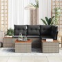 Graues 5-teiliges Garten-Sofa-Set aus Poly Rattan mit Kissen und Tisch.