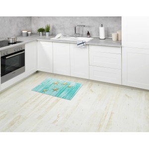 Mehrfarbige Wenko Badematte Mediaster 50x80 cm mit Seestern-Motiv in Küche.