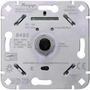 Kopp Digital RLC LED-Druck-Wechseldimmer 250W. Silberne Montageplatte mit Drehregler, Anschlüssen und Beschriftung.