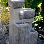Großer Gartenbrunnen mit 4 Stufen aus Polyresin, Wasserfall mit LED-Beleuchtung.