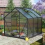 Vitavia Gewächshaus Calypso 4400, schwarzer Rahmen, 4,4 m² mit Fundament im Garten.