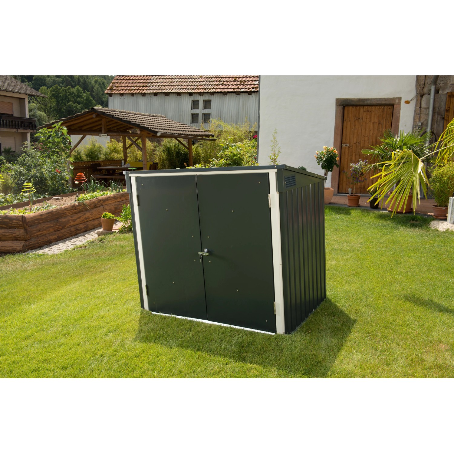 Duramax Mülltonnenbox, anthrazit/weiß, für 2 Tonnen, abschließbar, im Garten.