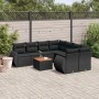 Schwarze 9-teilige Garten-Sofagarnitur aus Poly Rattan mit Kissen und Tisch.