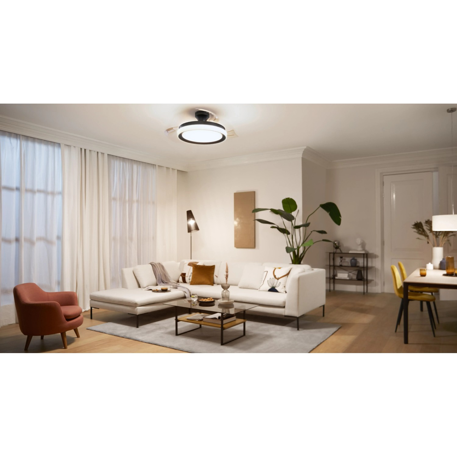 Schwarze Philips LED Deckenleuchte Bliss mit Ventilator in modernem Wohnzimmer.
