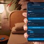 Bosch Smart Home Dimmer in Nutzung: Smartphone-App zur Steuerung der Hausautomation im Schlafzimmer.