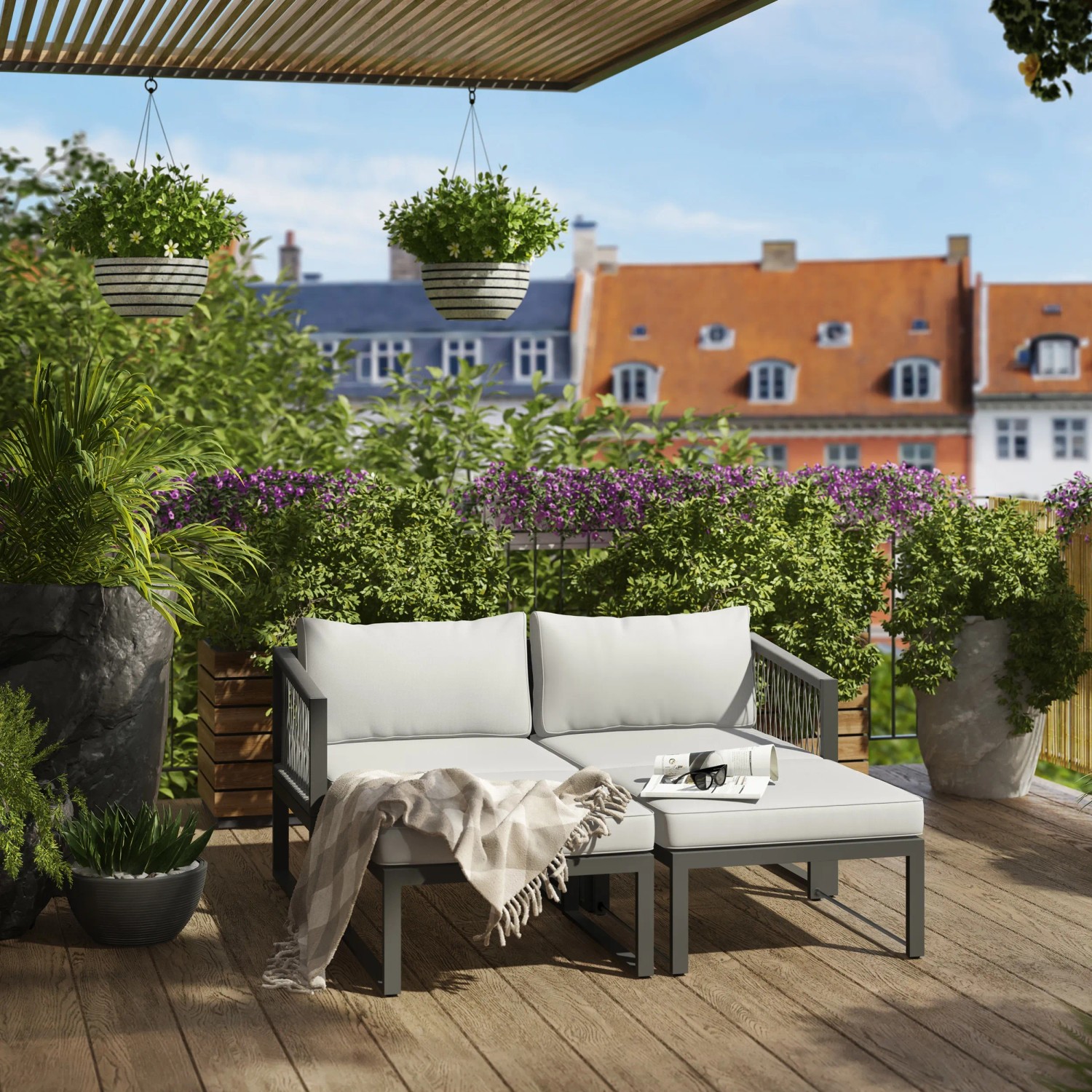4-teiliges Lounge-Set Willa aus Aluminium in Anthrazit mit grauen Auflagen und Kissen.