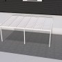 Weißes Gutta Terrassendach Premium mit Stegplatten aus Polycarbonat (6110x4060mm) am Haus.