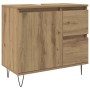 Waschbeckenunterschrank Artisan-Eiche mit Tür, 2 Schubladen, Aussparung für Waschbecken und schwarzen Haarnadelbeinen.