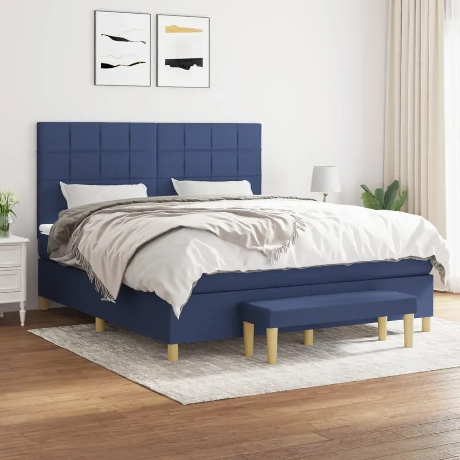 Blaues Boxspringbett (180x200 cm) mit Matratze, Kopfteil und Bank. Stoffbezug.