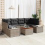 Graues 7-teiliges Garten-Sofa-Set aus Poly Rattan mit Kissen und Tisch.