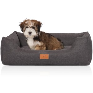 Graues Knuffelwuff Hundebett Lotte Velours (Größe M-L) mit Hund.
