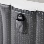 Detailaufnahme: Mobiler Whirlpool im Rattan Design mit Fernbedienung in Tasche.