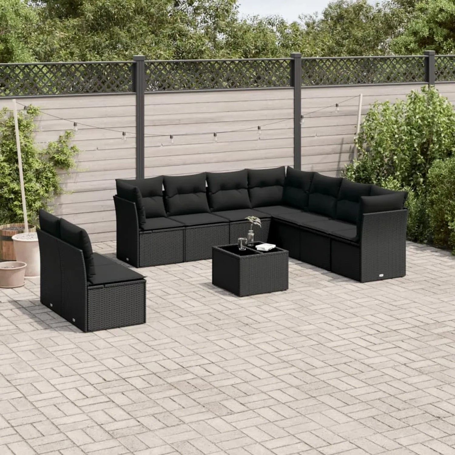 Schwarze 10-tlg. vidaXL Garten-Sofagarnitur aus Polyrattan mit Kissen und Tisch.