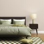 Beige-weiße A.S. Création Vliestapete Art Deco mit Glitzer und leichter Struktur im Schlafzimmer.