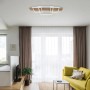 Moderne Globo LED-Deckenleuchte Vanni in Holzfarben/Weiß (95x40 cm) im Wohnraum.