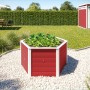 Rotes Weka Elementhochbeet 669 6-Eck im Garten mit Bepflanzung.