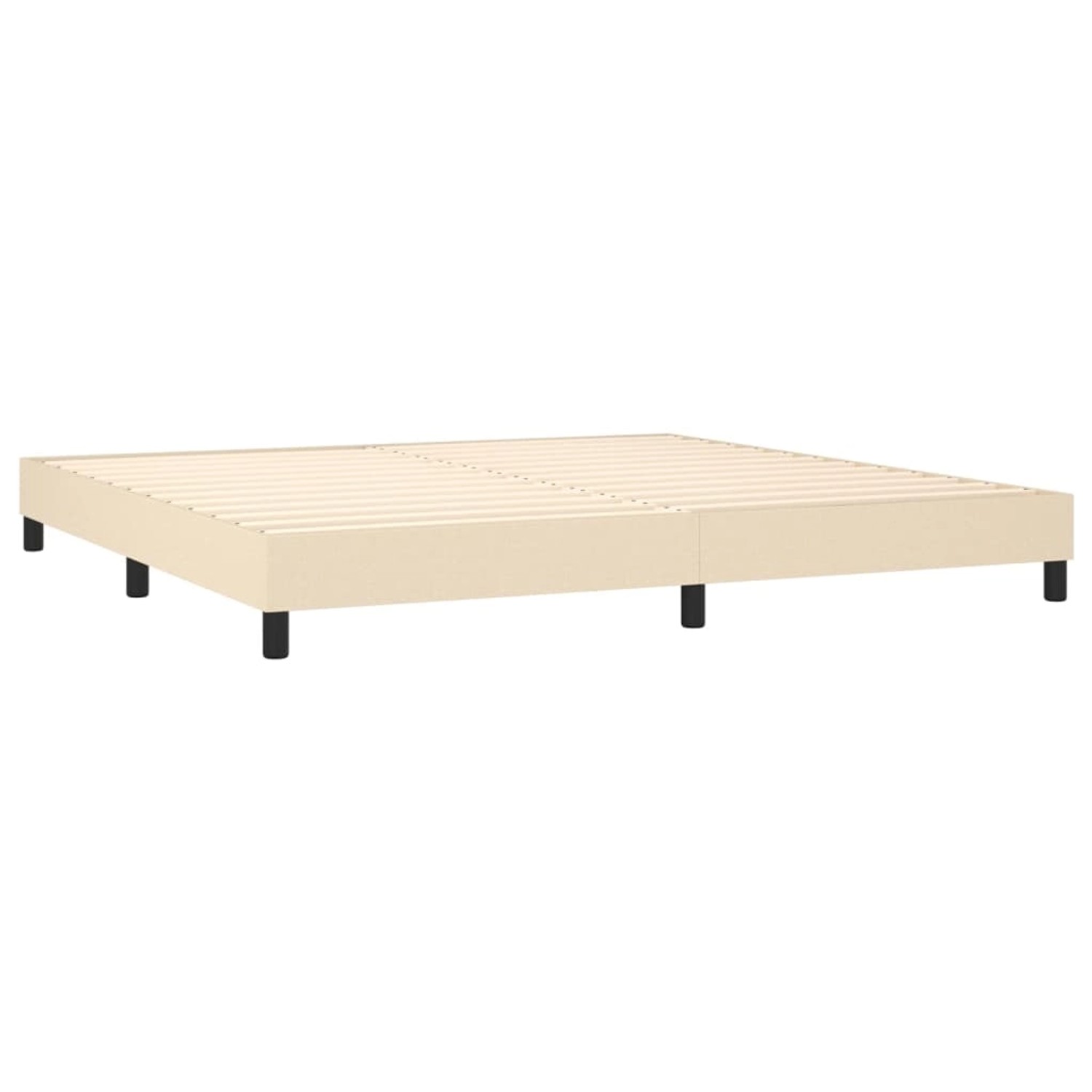 Cremefarbenes Boxspringbett 200x200 cm ohne Kopfteil. Bettrahmen mit Lattenrost und schwarzen Füßen.