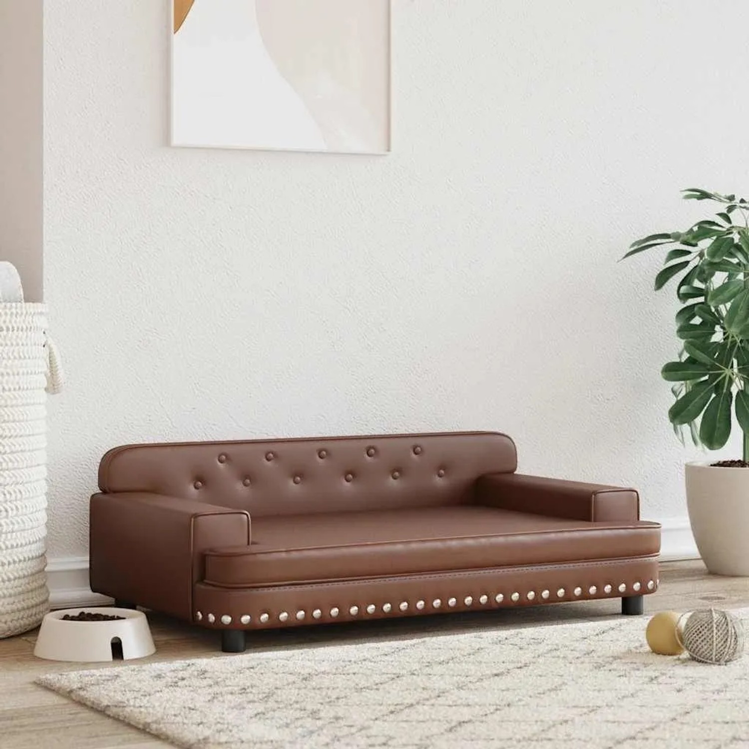 Braunes Hundebett aus Kunstleder im Sofa-Design mit Nieten. Gemütliches Hundekörbchen für kleine Hunde.