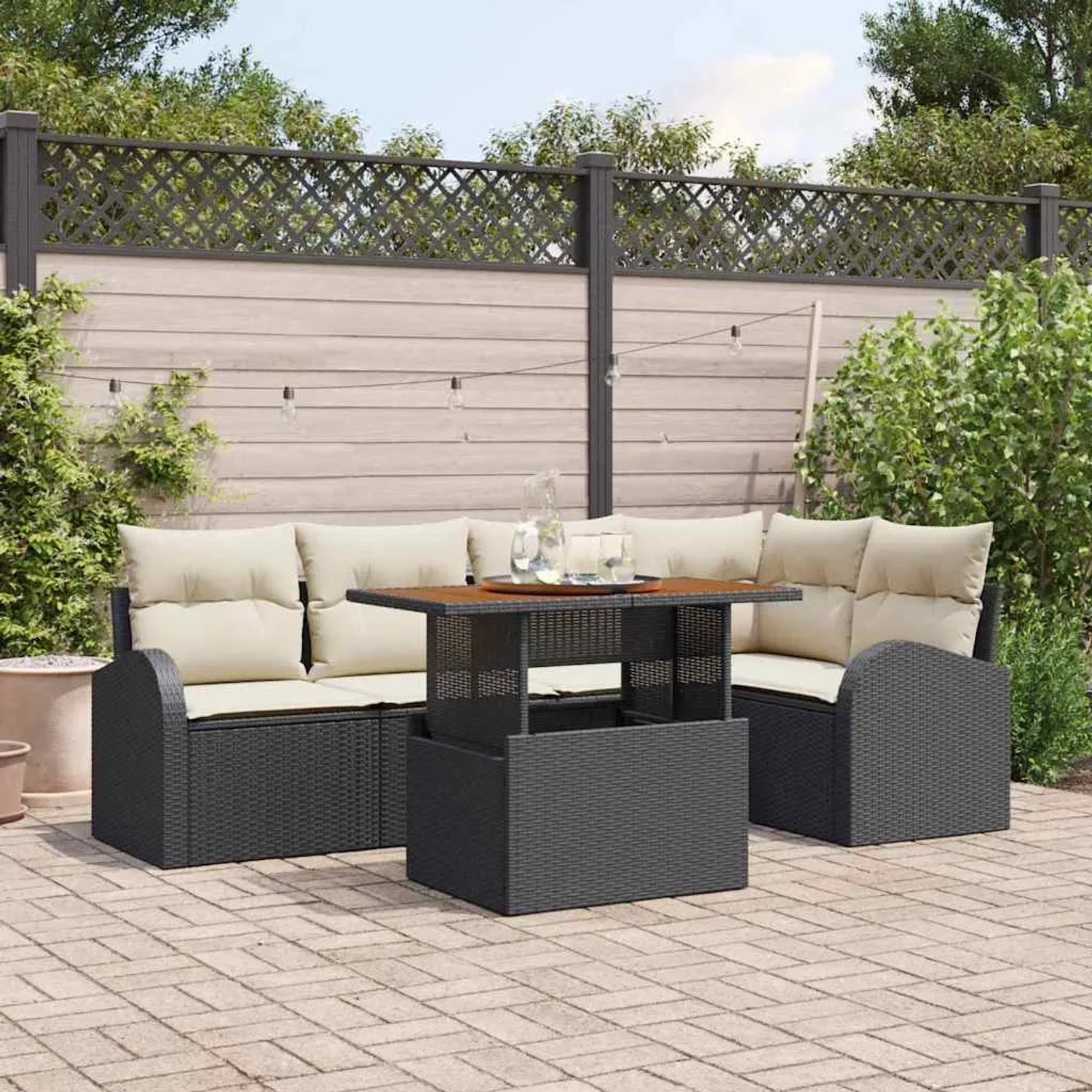 Schwarzes 6-tlg. vidaXL Garten-Sofa-Set aus Poly Rattan mit Tisch und Stauraum.