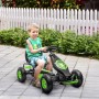 Lächelnder Junge fährt schwarzes HOMCOM Gokart mit grünen Akzenten und Pedalen auf gepflastertem Weg.