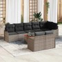 Graues 9-teiliges Garten-Sofa-Set aus Poly Rattan mit Tisch und schwarzen Auflagen.