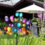 Farbenfrohes Relaxdays Windrad aus Eisen mit bunten Kugeln und Erdspieß im Garten. Dekoratives Windspiel für Outdoor.