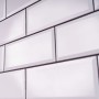 Geflieste Wand mit weißem Knauf Fugenmörtel Flexfuge smart, Fugenmasse.