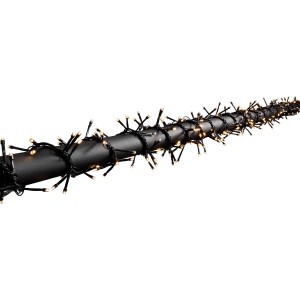 Konstsmide LED Büschellichterkette mit 240 warmweißen LEDs für innen und außen, gewickelt um ein Rohr.