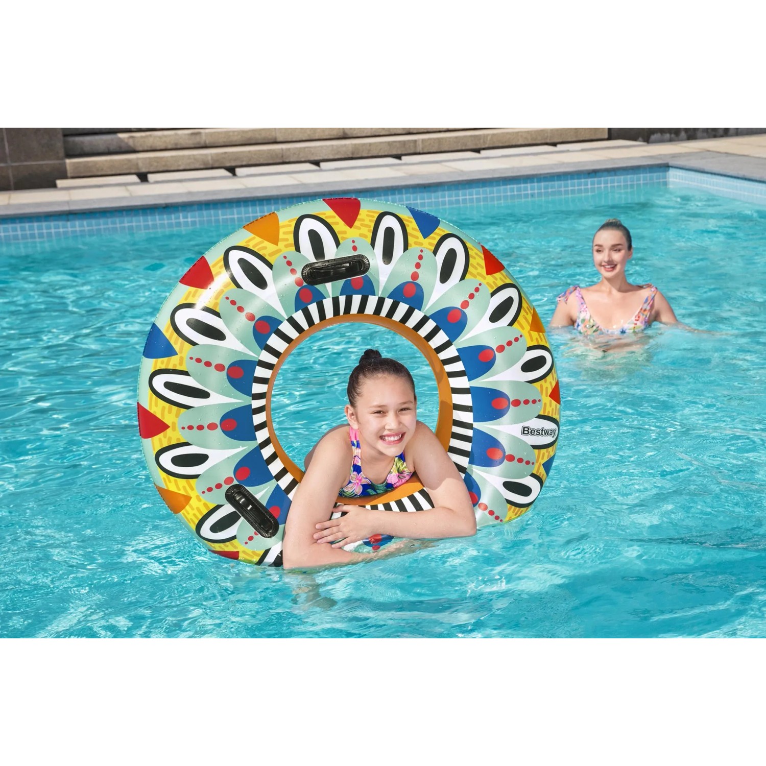 Bestway Schwimmring Flirty Fiesta (Ø 94 cm) im Pool mit Kind. Farbenfrohes Design.
