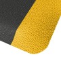 Detailaufnahme: Schwarz-gelbe KARAT Anti-Ermüdungsmatte Soft-Tritt mit genoppter Oberfläche.